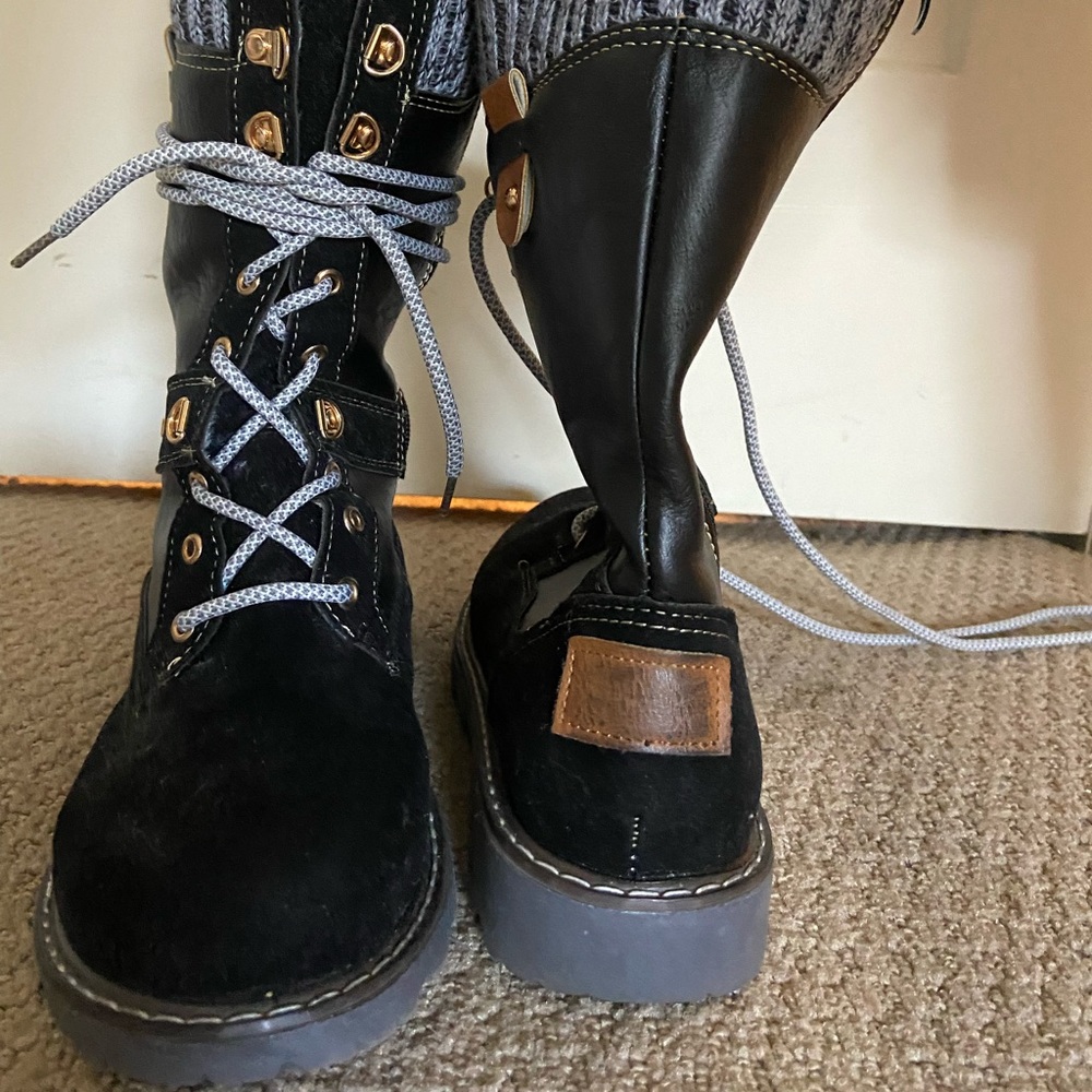 Black combat boots by HKR